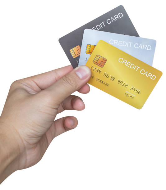 istock Hand holding credit card isolated on white background. 1431594094