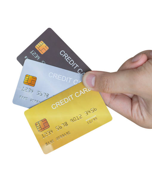 istock Hand holding credit card isolated on white background. 1431594140