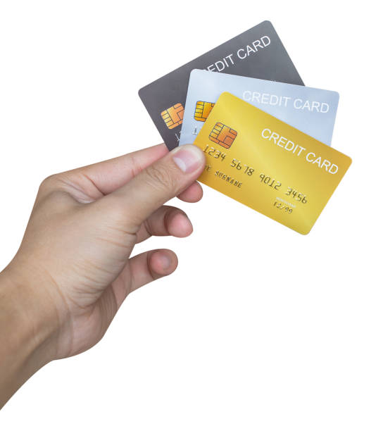 istock Hand holding credit card isolated on white background. 1431594141