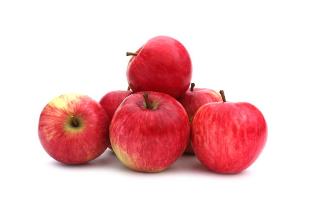 istock A bunch of red apples lies on a white background. 1431594154