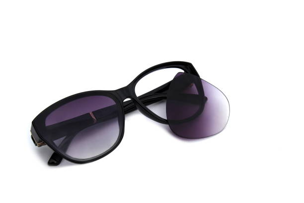 istock Broken sunglasses lie on a white isolated background. 1431594187