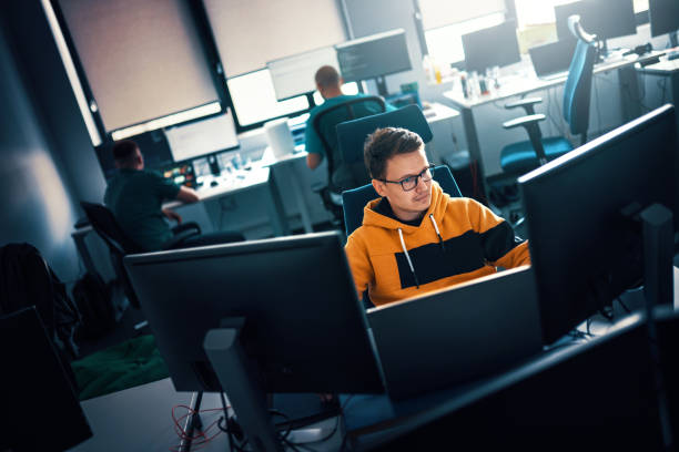 Software developers at the office. stock photo