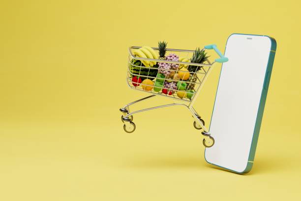 istock buying fruit on the Internet. a smartphone from which a fruit cart flies out. copy paste, copy space. 3D render 1431595767