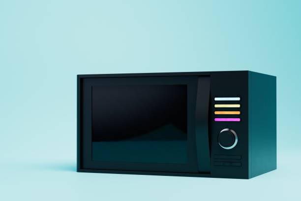 istock cooking in the microwave. a black microwave oven on a blue background. 3D render 1431596663