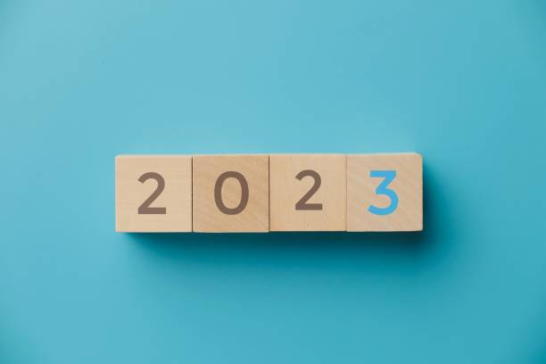 istock The numbers 2023 on a wooden dice placed on a blue background. 1431605027