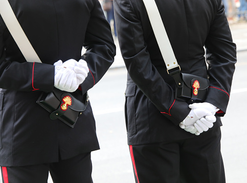 Vicenza, VI, Italy - June 2, 2022: Two Carabinieri of the Italian law enforcement agencies with white gloves
