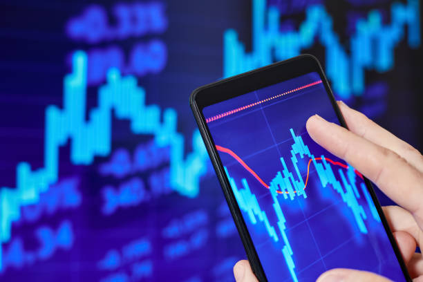 istock Trader analyzes stock market data in smartphone 1431606544