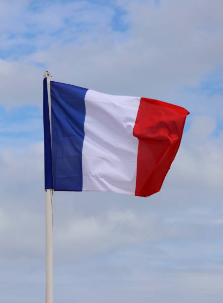 istock French flag waving blue sky background 1431607228