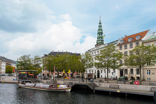 Copenhagen, Denmark. October 2022. a tourist boat on Frederiksholms Kanal in the city center