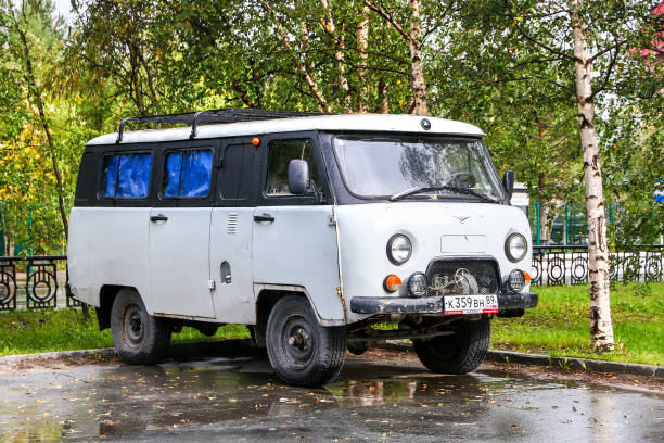UAZ-39625 Nadym, Russia - September 4, 2022: Offroad passenger van UAZ-39625 in the city street. uaz 4x4 land vehicle woods stock pictures, royalty-free photos & images