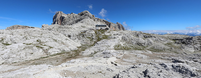 Panorama Dolomites Mountains on the Alps in Northern Italy and the alpine refuge called ROSETTA