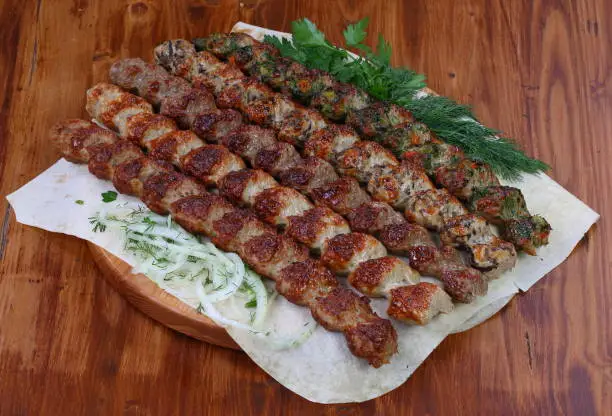 Assorted lulekebab on wooden background