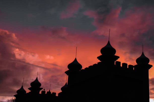 Baku, Azerbaijan, on a sunny summer day. Buildings at sunset, just the horizon show colorful night Azerbaijan Baku. Beautiful Silhouette Sunset over the Baku city Azerbaijan. Skyline view of building , hotel and resident in business district