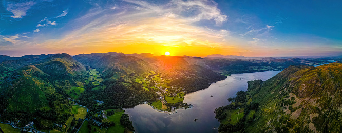 Aerial view of sunset over Ullswater lake in Lake District, a region and national park in Cumbria in northwest England, UK