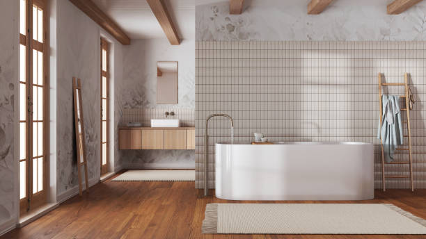 Japandi minimalist bathroom in white and beige tones. Freestanding bathtub and wooden washbasin. Farmhouse interior design stock photo