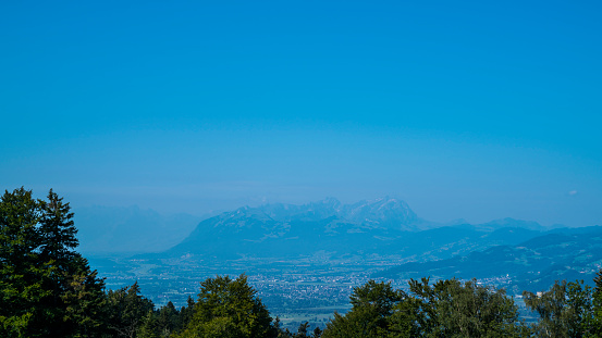 Austria, beautiful panorama view above bregenz city houses, luxembourg, switzerland mountains to saentis summit snow covered mountain peak