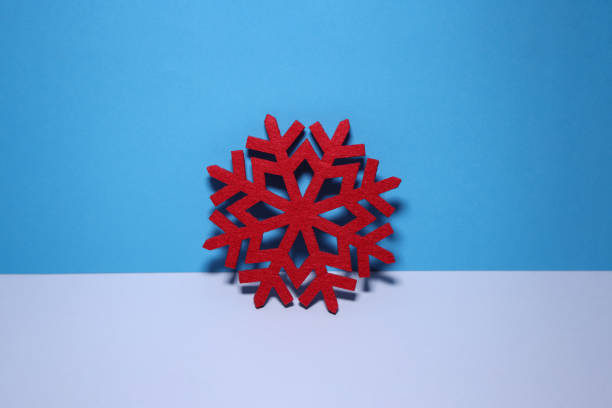 Snowflake on blue color background. Christmas concept