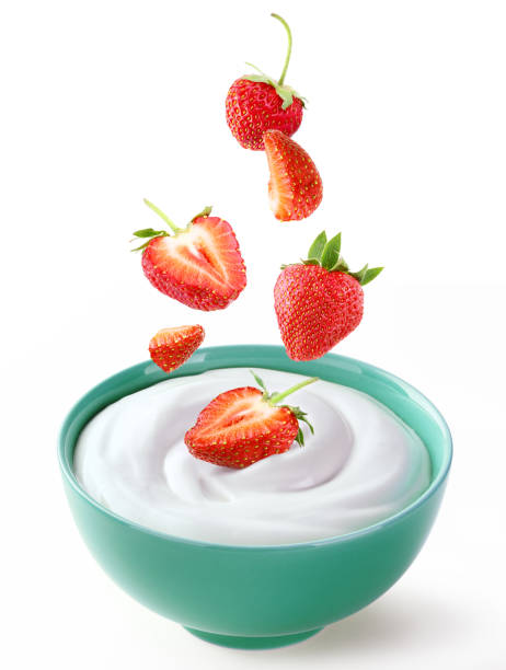 istock cream sour in ceramic bowl with strawberries pieces 1431640398