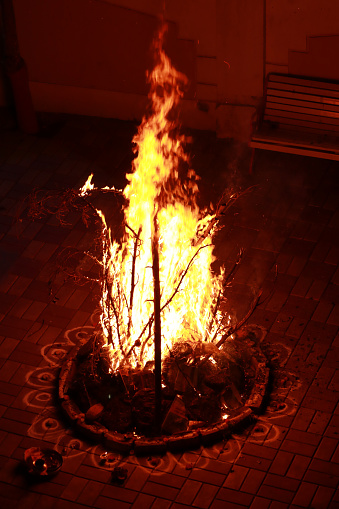 large wood fire as a ritual in hindu culture, celebrated as holika dahan or lohri at North india