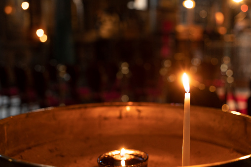 Votive candle inside church