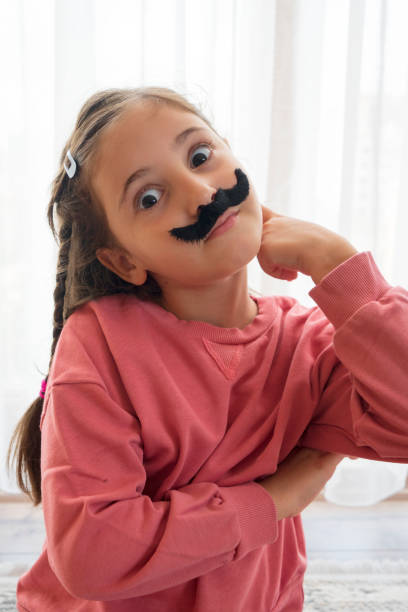 istock Mustached Little Girl 1431647372