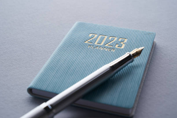 istock diary 2023 and silver fountain pen 1431656975