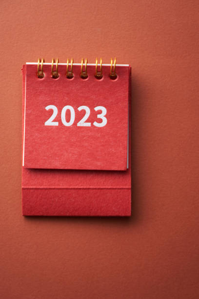 istock 2023 desk calendar on color background 1431658079