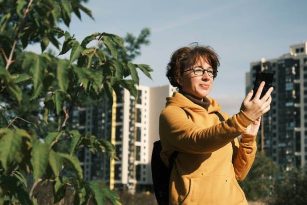 istock Woman is taking selfie by phone 1431662781