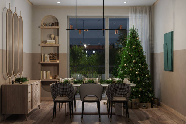 столовая с елкой, украшениями, подарочными коробками и рождественской сервировкой стола ночью - fashionable party design home decorating стоковые фото и изображения