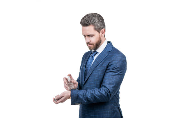 istock try this one. handsome man choose perfume. masculine cosmetics. male perfumery. 1431675840