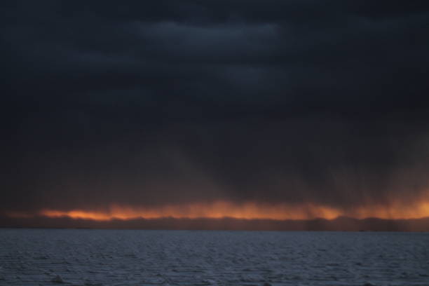 istock Amazing storm at salt flat desert on sunset 1431678839