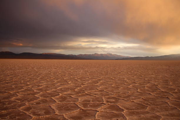 Amazing storm at salt flat desert on sunset