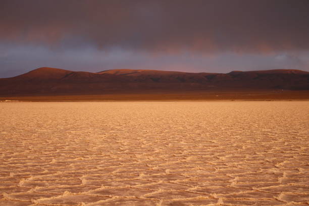 istock Amazing storm at salt flat desert on sunset 1431679563
