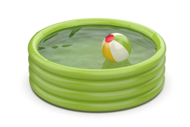 Green swimming pool and beach ball