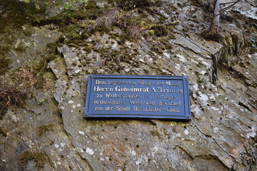 Bernkastel-Kues, Germany - 08/25/2022: memorial plate at a cliff