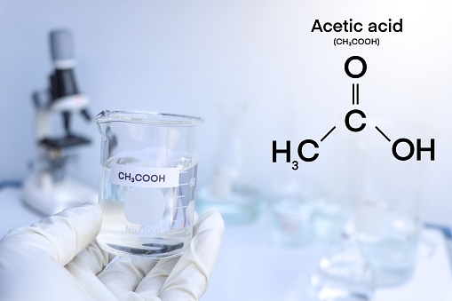 acetic acid in glass, chemical in the laboratory and industry, corrosive chemical