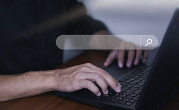 istock Man's using a computer keyboard to Searching for jobs and information. data search technology search engine optimization. use of technology is beneficial. 1431699424
