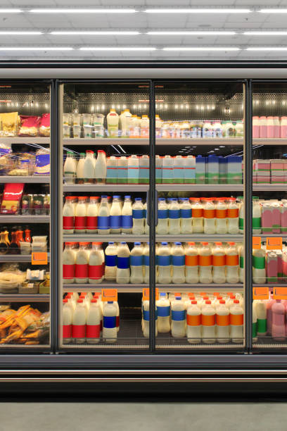 istock Yoghurt and milk in glass door fridge 1431703039