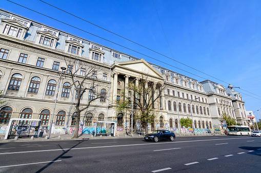 Bucharest, Romania, 6 November 2021: Main building of Bucharest University (Universitatea Bucuresti), hosting the Math, History and Business Administration Faculties, in a sunny autumn day