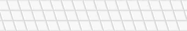 istock White rhombus tile in diagonal arrangement. Kitchen backsplash background. Bathroom or toilet ceramic wall or floor mosaic seamless pattern. Facade decoration texture 1431708063