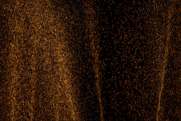 istock Water splash on black background. Abstract brown and white color image. 1431712838