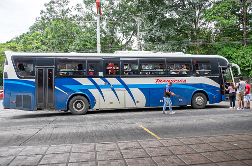 Alajuela, Costa Rica - September 19, 2022: Public transport bus at La Fortuna station