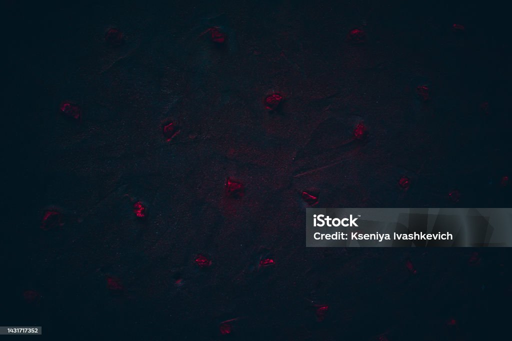 Rock texture. Dark stone wall. Stone background. Rock surface with holography, nacre. Wall abstraction. Paint spots. Rock surface with cracks. Abstract texture. Abstract Stock Photo