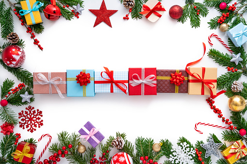Christmas gifts on the wooden background 