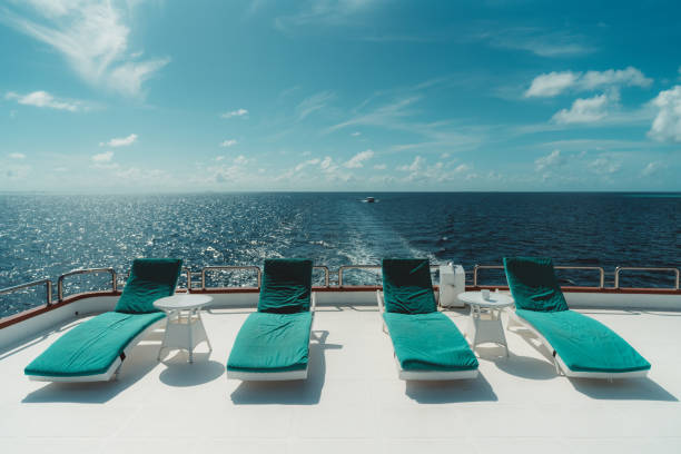 A top deck of a vessel with daybeds