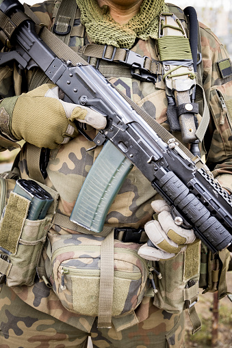 NATO soldiers military equipment : Camouflage uniform and machine gun Beryl