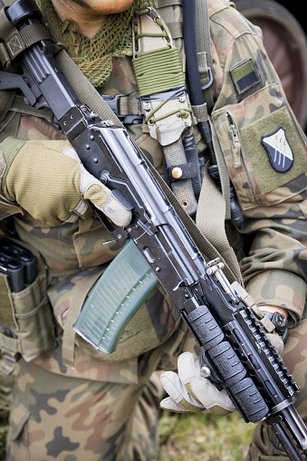 NATO soldiers military equipment : Camouflage uniform and machine gun Beryl