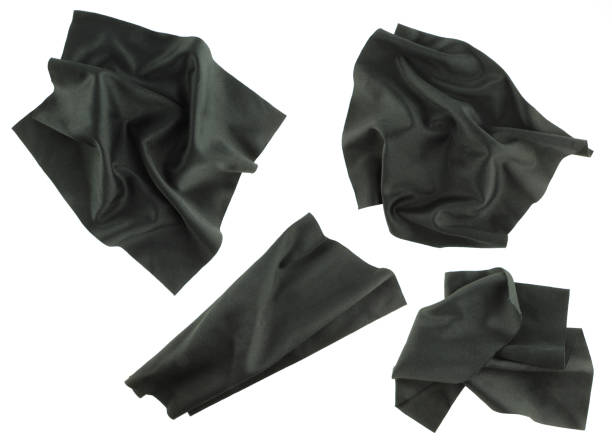istock Crumpled black eyewear cleaning cloth isolated on white background. Linen light texture 1431732873
