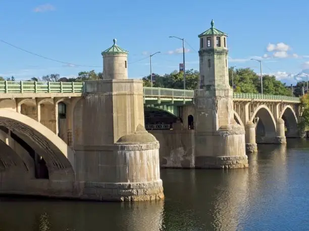 Basiliere bridge crossing the Merrimack river between Bradford and Haverhill Massachusetts. The historic Basiliere bridge built in 1925 is a bascule style bridge and as of 2022 considered deficient is is scheduled for replacement in 2025.