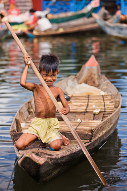 istock Little boy in the boat, Cambodia 143174306